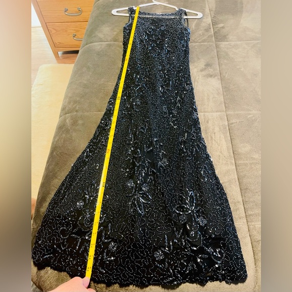 A gorgeous mid length beaded dress by Scala. - Picture 7 of 11